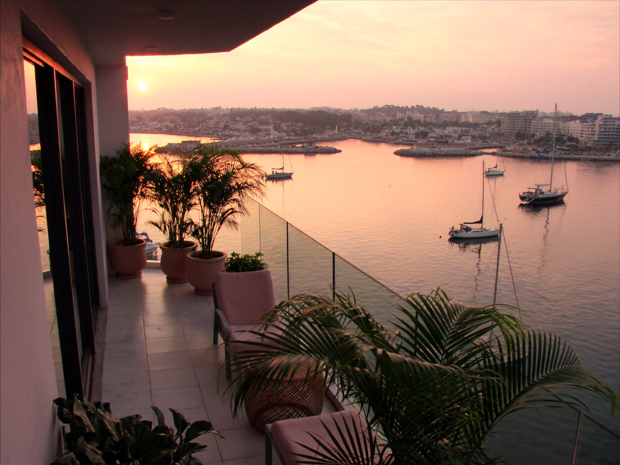 Marina apartment balcony at Cullen Bay with boats moored below