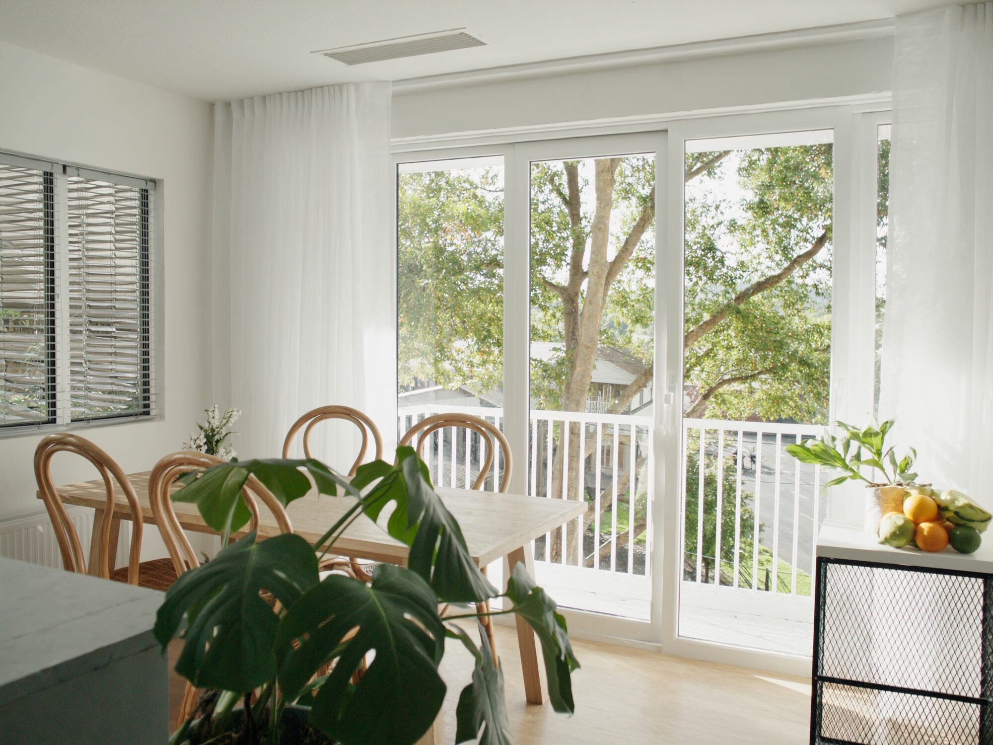 Bright Parap Village apartment with a small balcony over the leafy market strip
